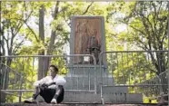  ?? EAMON QUEENEY/FOR THE WASHINGTON POST ?? The pedestal from which “Silent Sam” gazed stands empty after protesters yanked him down recently.