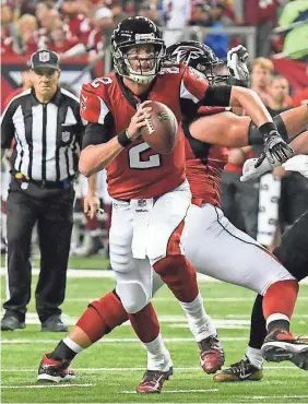  ?? DALE ZANINE, USA TODAY SPORTS ?? The Falcons’ Matt Ryan led the league in QB rating (117.1) this season and was second in passing yards (4,944) and touchdown passes (38).