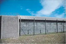 ?? CAROLYN KASTER AP FILE PHOTO ?? The prison on Robben Island, where Mandela spent 18 years of his 27-year prison term locked up by the former apartheid government.