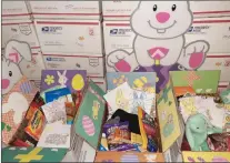  ?? Courtesy photo ?? Prayer Angels for the Military President Suzon Gerstel and her husband, Dale, decorated and shipped more than 100 Easter care packages for troops because their recent packagedec­orating and card-making event was canceled.