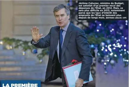  ?? [BERTRAND LANGLOIS / AFP] ?? Jérôme Cahuzac, ministre du Budget, est satisfait d’un premier recul des dépenses de l’État, en 2012. Mais, ce sera plus difficile en 2013, notamment parce que les taux d’intérêt des emprunts de l’État ne baissent plus depuis de longs mois.