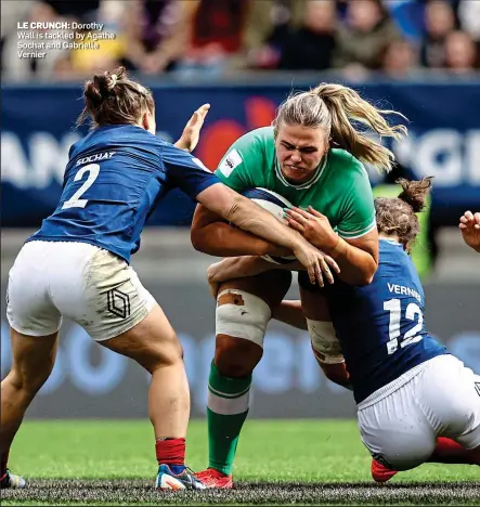  ?? ?? LE CRUNCH: Dorothy Wall is tackled by Agathe Sochat and Gabrielle Vernier