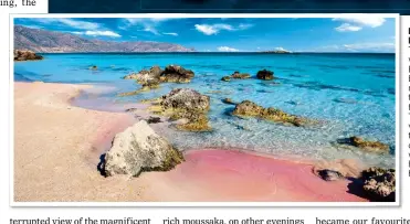  ?? ?? PINK PARADISE: The warm waters at Elafonisi beach are never more than a few feet deep. Top: A view of the city of Chania with its historic harbour