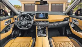  ??  ?? In the 2021 Rogue crossover, informatio­n is all-access with three available displays: a fully digital dashboard, an impressive 9-inch touch screen and a heads-up display that projects essentials like speed and turn-by-turn directions onto your windshield.