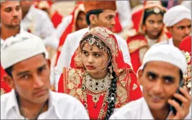  ??  ?? Brides and grooms take part in a mass marriage ceremony in Ahmedabad on 22 January, 2016. (Reprasenta­tional image)