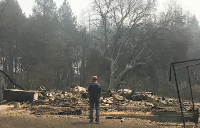  ?? Debórah Eliezer ?? Noor Adabachi surveys the ruins of the Venado Retreat, which burned down in the Walbridge Fire in Sonoma County.