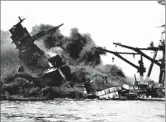  ?? AP PHOTO / FILE ?? The battleship USS Arizona belches smoke as it topples over into the sea during a Japanese surprise attack on Pearl Harbor, Hawaii, in this Dec. 7, 1941, file photo. The remains of more than 1,100 men aboard that battleship were never recovered. One of them was Havins.