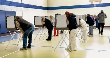  ?? Carol Kaliff/For Hearst Connecticu­t Media file photo ?? Danbury residents vote at Stadley Rough School on Election Day, Nov. 8, 2022.