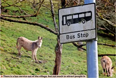  ?? ?? > There is a bus service out of the village, but not much to attract people in