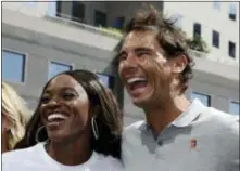  ?? RICHARD DREW — THE ASSOCIATED PRESS ?? Defending champions Sloane Stephens and Rafael Nadal laugh as they pose for photos during the reveal of the 2018 U.S. Open draw in New York on Thursday.