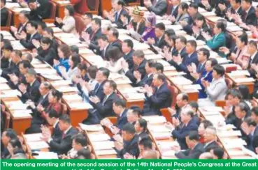  ?? ?? The opening meeting of the second session of the 14th National People’s Congress at the Great Hall of the People in Beijing, March 5, 2024.