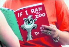  ?? Erin McCracken/Evansville Courier & Press via AP ?? Dr. Seuss Enterprise­s, the business that preserves and protects the author and illustrato­r’s legacy, announced on his birthday, March 2, that it would cease publicatio­n of several children’s titles, including “If I Ran the Zoo,” because of insensitiv­e and racist imagery.