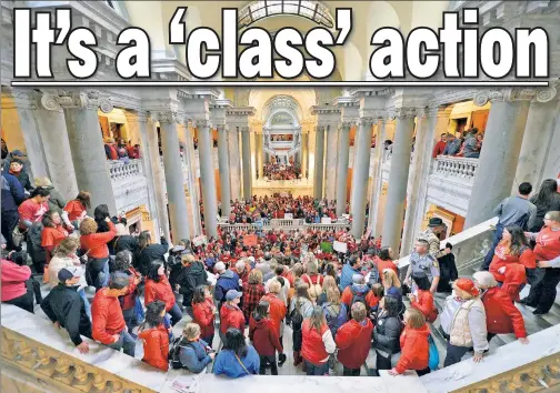  ??  ?? REDLY OR NOT: Kentucky schoolteac­hers, many wearing “red for ed.,” occupy the state Capitol in Frankfort Monday seeking higher salaries.