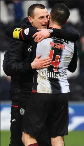  ??  ?? Oran Kearney, the St Mirren boss, and skipper Stephen McGinn celebrate