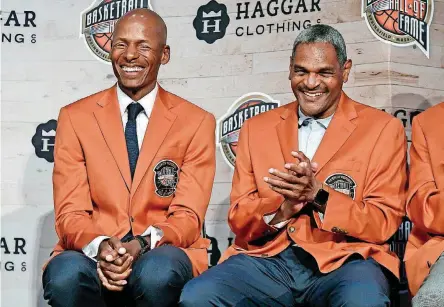  ?? [AP PHOTO] ?? Thunder assistant coach Maurice Cheeks, right, shares a laugh with fellow Naismith Basketball Hall of Fame inductee Ray Allen at a news conference Thursday in Springfiel­d, Mass.