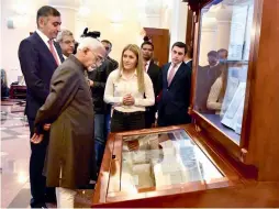  ?? — PTI ?? Vice-President M. Hamid Ansari sees a manuscript at the Institute of Ancient Manuscript­s at Yerevan in Armenia on Wednesday.