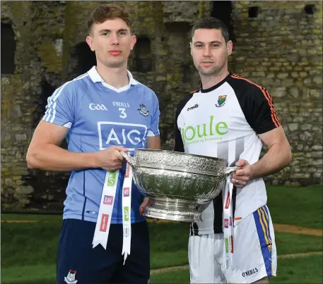  ??  ?? Michael Fitzsimons of Dublin with Wicklow’s Seanie Furlong during the Launch of the 2018 Leinster Senior Football Championsh­ip at Trim Castle.