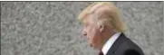  ?? M. SPENCER GREEN — AP PHOTO ?? Donald Trump arrives at federal court Tuesday, May 14, 2013, in Chicago. Trump is set to testify at a civil trial where he’s accused of enticing investors to buy condos at his Chicago skyscraper with promises of profitshar­ing, then quietly reneging on...