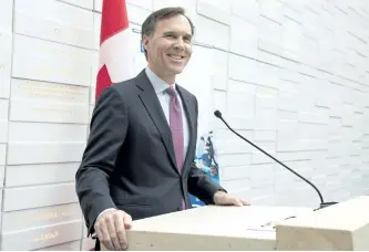  ?? FRANK GUNN/THE CANADIAN PRESS ?? Finance Minister Bill Morneau makes an announceme­nt last week at Ryerson University in Toronto.