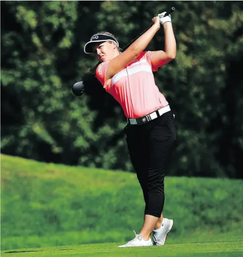  ?? STUART FRANKLIN / GETTY IMAGES ?? Canada’s Brooke Henderson is two shots off the lead at the Evian Championsh­ip in France.