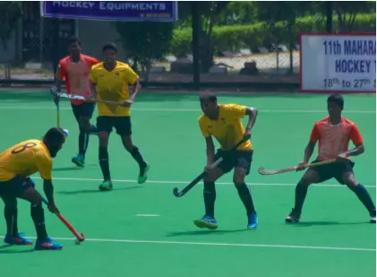  ??  ?? Action from a Pool A match between Punjab National Bank and ASC Bangalore in the Maharaja Ranjit Singh hockey tournament in New Delhi on Sunday. PNB won 8-1.