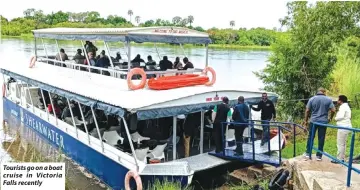  ?? ?? Tourists go on a boat cruise in Victoria Falls recently