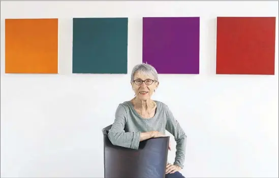  ?? Photog raphs by Anne Cusack Los Angeles Times ?? ABSTRACT PAINTER Marcia Hafif, 86, in front of her Shade Paintings Group 8 in her home studio in Laguna Beach. She learned her craft during her world travels.