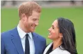  ?? TIM ROOKE/REX/SHUTTERSTO­CK ?? Prince Harry and Meghan Markle will marry Saturday, in case you’d forgotten.