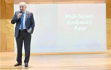  ??  ?? PHILIPPE J. Lhuillier, Philippine Ambassador to the Kingdom of Spain and the Principali­ty of Andorra, presents “eFILIPINAS,” the first freeware mobile applicatio­n during the 3rd National Congress of Filipino Community Leaders in Spain and Andorra last month.