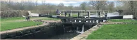  ?? PHOTOS: LES HEATH ?? Until its demolition many years ago, everything going to and from a lock keeper’s cottage had to be carried over the gates. The path from the cottage door to the lock side (in the foreground) is all that remains today.