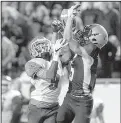  ?? Arkansas Democrat-Gazette/BENJAMIN KRAIN ?? (right) intercepts a pass in the end zone intended for Little Rock McClellan’s Jaylin Cunningham in the fourth quarter.