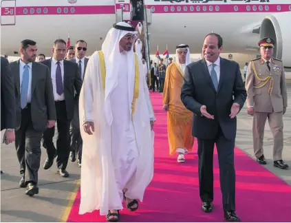 ?? Mohammed Al Hammadi / Crown Prince Court Abu Dhabi ?? Sheikh Mohammed bin Zayed, Crown Prince of Abu Dhabi and Deputy Supreme Commander of the Armed Forces, is greeted at Cairo airport yesterday by the Egyptian president Abdel Fattah El Sisi.