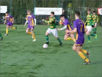  ??  ?? Hat-trick hero Todd Hynes takes the ball into the box before finishing.