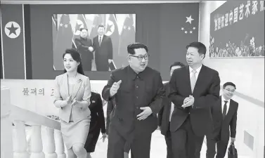  ?? KCNA VIA REUTERS ?? DPRK top leader Kim Jong-un meets Song Tao, the head of the Communist Party of China Central Committee’s Internatio­nal Department, who led an art troupe to Pyongyang on Saturday.