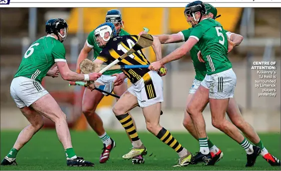  ?? ?? CENTRE OF ATTENTION: Kilkenny’s TJ Reid is surrounded by Limerick players yesterday