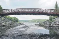  ??  ?? One of Arrowhead Provincial Park’s iconic pedestrian bridges.