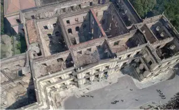  ?? — AFP ?? An aerial view of Rio de Janeiro's National Museum on Monday, a day after a massive fire ripped through the building.