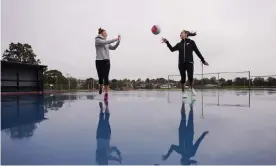  ?? Photograph: Michael Dodge/AAP ?? Madi and Kelsey Browne of the Magpies train at their local court during isolation before a return to Super Netball.