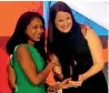  ??  ?? Tara Mullins, Seniorvice President of Ogilvy Media Influence accepting the award from Aarti Shah, Senior Editor of the Holmes Report