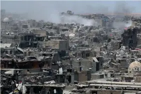  ??  ?? This file photo shows a general view of the destructio­n in Mosul’s Old City. The battle is over, it’s now time to start rebuilding Iraq’s second city, parts of which were literally flattened during the offensive against holed up jihadists of the...