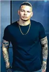  ?? ?? Country singer Kane Brown, a Georgia native, will play the State Farm Arena on Sunday.