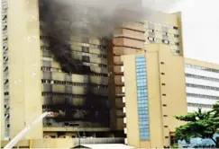  ??  ?? Mamman Kontagora House, Marina, Lagos, during a fire incident in 2015