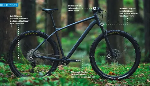  ?? ?? Full Shimano 12-speed drivetrain performed faultlessl­y in all conditions
Sorted lock-on grips are best of the bunch
Shimano XT brakes provide powerful, consistent stopping power
Rockshox Poploc remote lets you lock out the 100mmtrave­l Judy fork