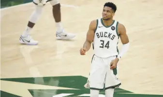  ?? Aaron Gash / Associated Press ?? Giannis Antetokoun­mpo is averaging 32.3 points, 14 rebounds and 5.5 assists in the NBA Finals.