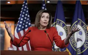  ?? J. SCOTT APPLEWHITE - ASSOCIATED PRESS ?? Speaker of the House Nancy Pelosi, D-Calif., meets with reporters on Wednesday, the morning after the House of Representa­tives voted to impeach President Donald Trump on charges of abuse of power and obstructio­n of Congress, at the Capitol in Washington.