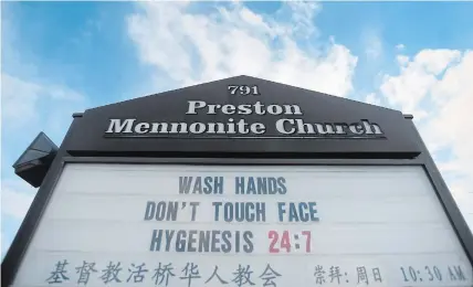  ?? DAVID BEBEE WATERLOO REGION RECORD ?? A sign at Preston Mennonite Church offers some friendly advice disguised as biblical scripture on hygiene during the pandemic.