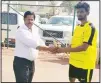  ??  ?? A player receives award from KIFF
official.
