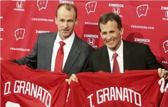 ?? Amber Arnold/Wisconsin State Journal ?? Wisconsin assistant coach Don Granato, left, and his brother, head coach Tony Granato, are introduced at a press conference March 30, 2016, in Madison, Wis.