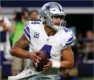  ?? File, Michael Ainsworth / AP ?? Dallas Cowboys quarterbac­k Dak Prescott drops back to pass against the Philadelph­ia Eagles.