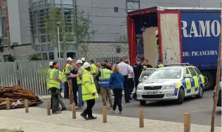  ??  ?? Stopped: Police detain migrants found in a van full of mattresses in Canterbury